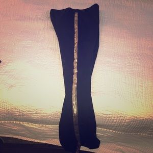 Black leggings with gold accent